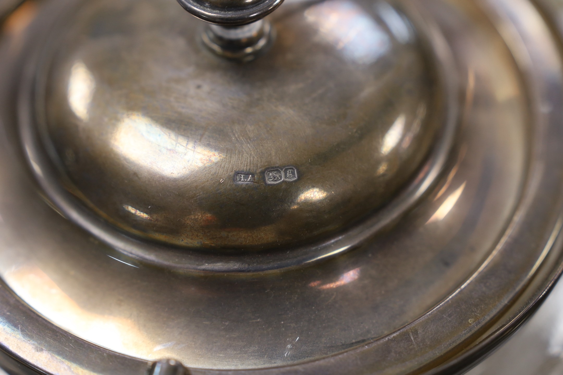 A George V silver mounted glass bowl and cover and other sundry silver including napkin rings, vesta case and condiments.
